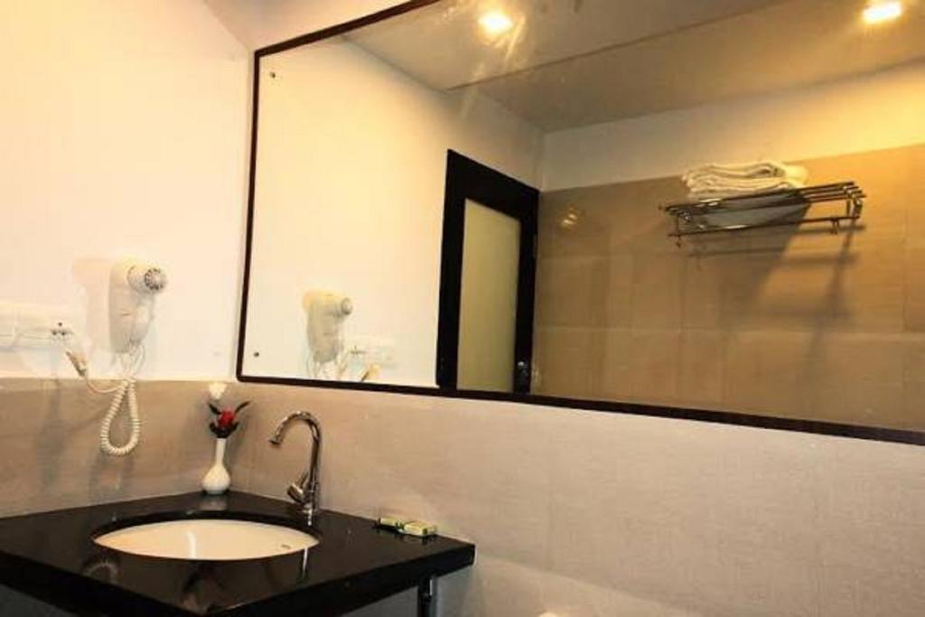 Inn Aavass Paradise Mysore