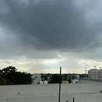 Roof Top Couple Stay Cozy