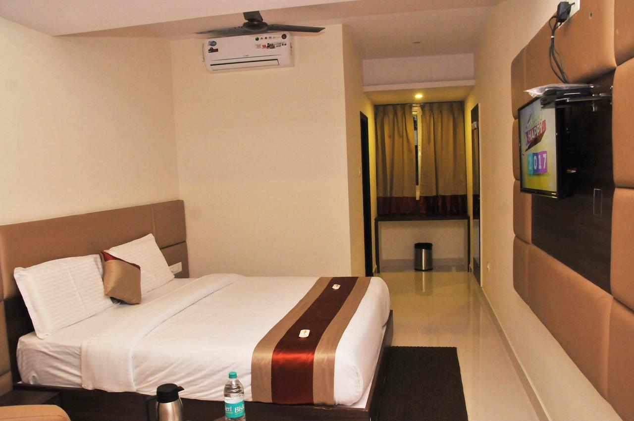 Hotel Capital O 76622 Raama Grand Mysore